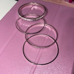 Thin metal bangles, silver color